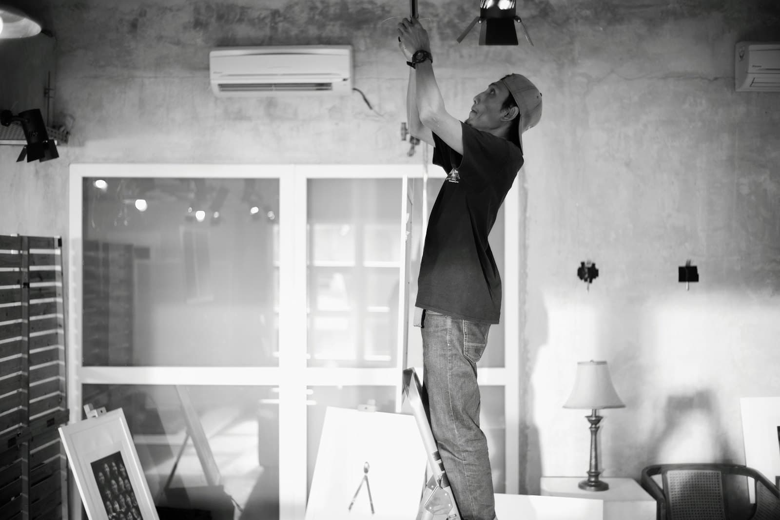 Electrician working on wiring—our technicians on site for panel and electrical work